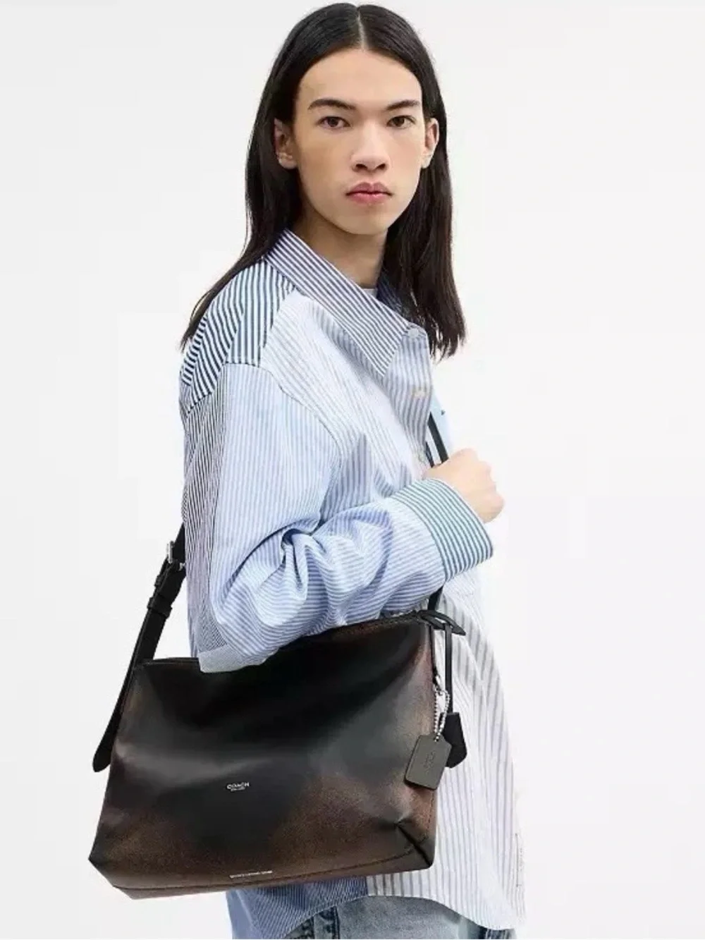 COACH Mott Messenger Bag In Loved Leather Black/Light Tan